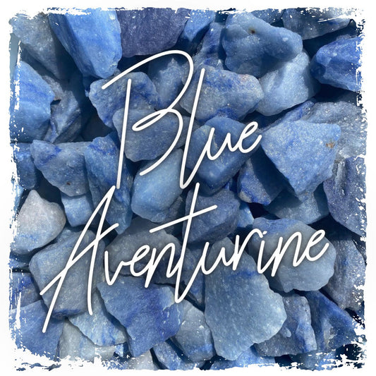 a collection of shimmery blue blue aventurine stones in rough cut form, showing the blue streaks through quartz