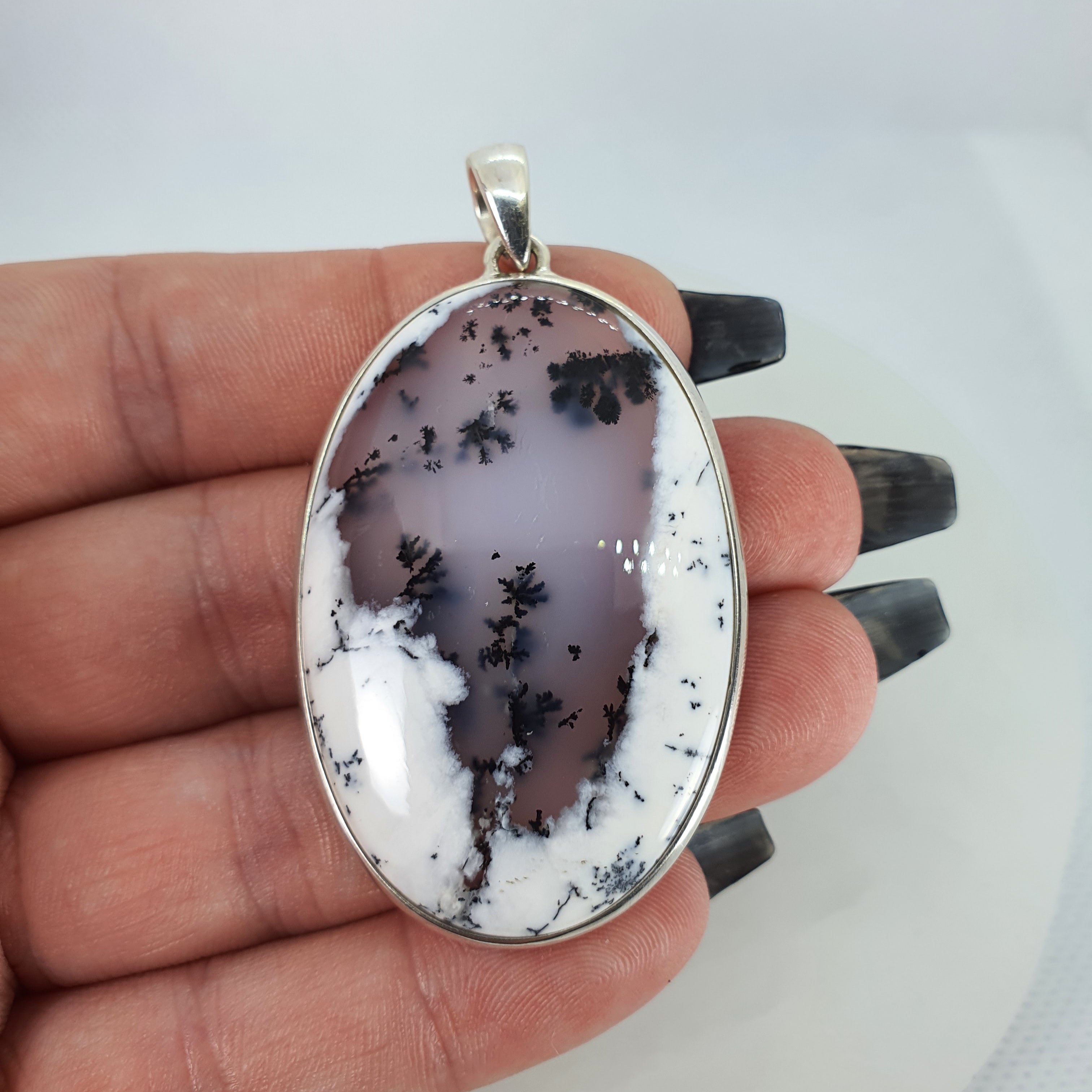 Merlinite pendant hot sale